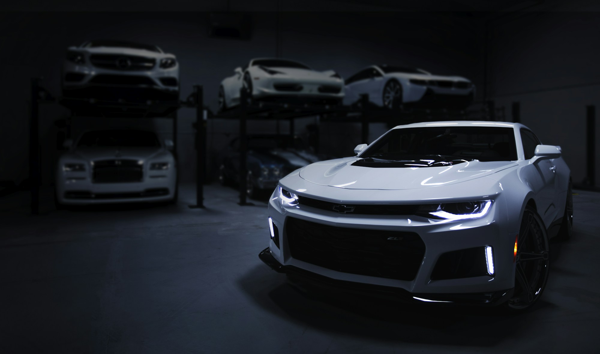 Modern sports car in a dramatic dark setting